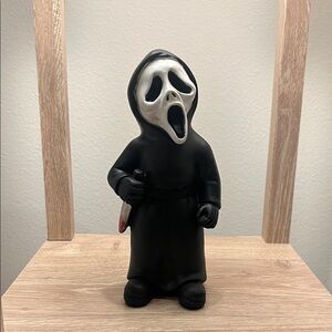 Ghost Face Figurine with Knife